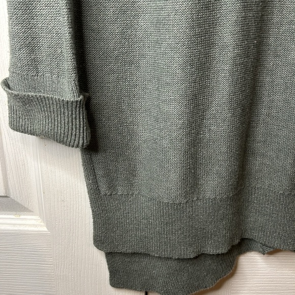 Size Medium Long Sweater. Low cut criss crossed back - Picture 2 of 6